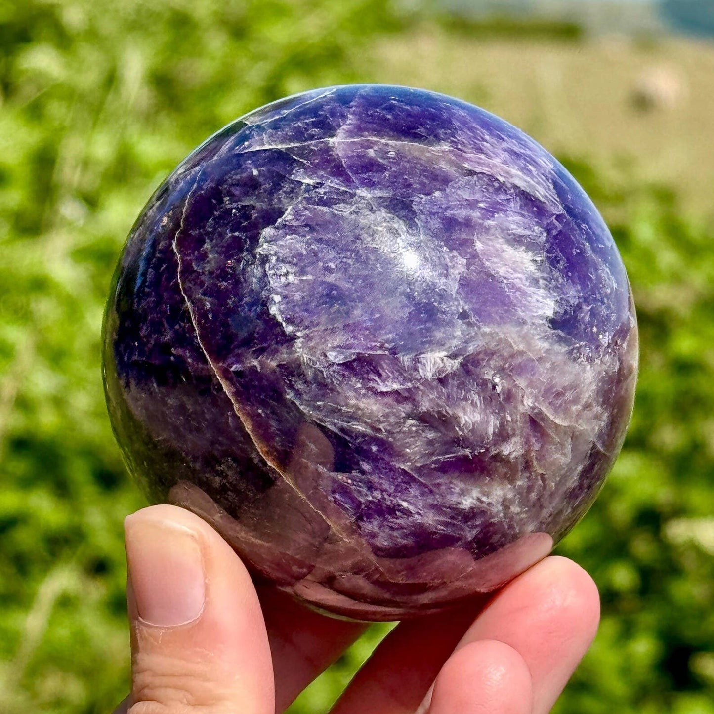 Amethyst sphere carving